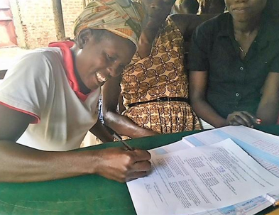Uganda Women Writing Ledger