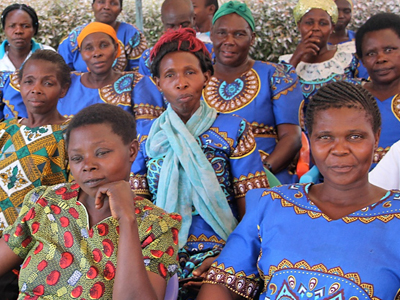 African Women Learning About Microfinance